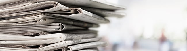 Artikel-Tipp Cross-Selling Potentiale realisieren Zeitungsstapel